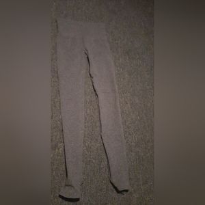 Dark gray compression leggings with foot holes